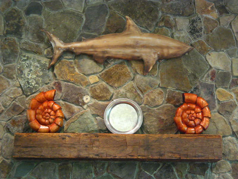 Wood Ammonites and Shark Chainsaw Sculptures